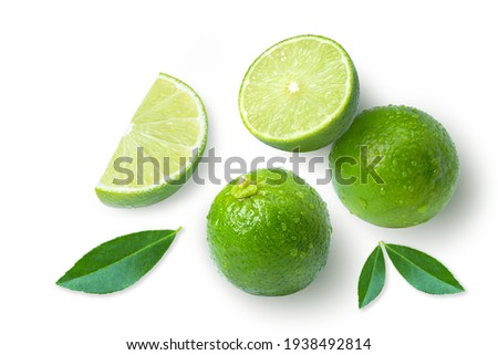 Lime fruits with green leaf and cut in half slice isolated on white background, top view, flat lay. Royalty-Free Stock Photo #1938492814