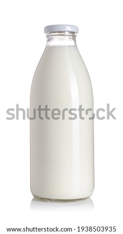 Milk bottle. Isolated on white background Royalty-Free Stock Photo #1938503935