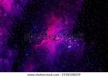 A beautiful, bright space nebula. Elements of this image were furnished by NASA. High quality photo Royalty-Free Stock Photo #1938508039
