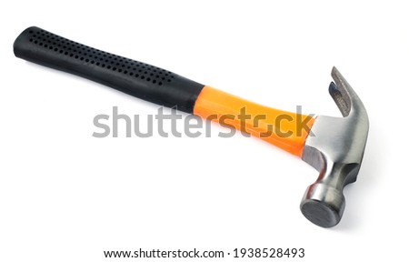 Close Up orange iron hammer with medium black rubber grip. It is a tool for nailing the roof. Isolated on white background. with clipping path. Royalty-Free Stock Photo #1938528493