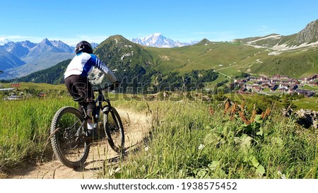 mountain bike in the alps Royalty-Free Stock Photo #1938575452