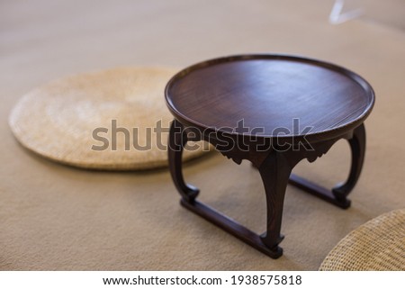 Korean traditional small portable dining table with cabrioles Royalty-Free Stock Photo #1938575818