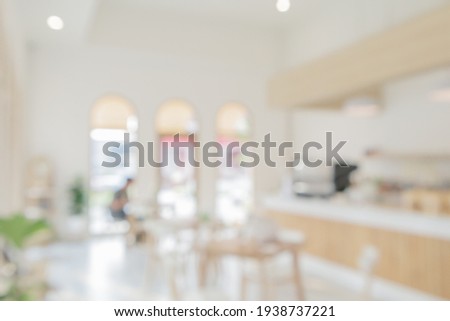 Coffee shop or cafe restaurant interior blur for background Royalty-Free Stock Photo #1938737221