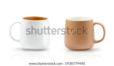 Set of two empty cups isolated on white background with soft shadow and reflection Royalty-Free Stock Photo #1938779440