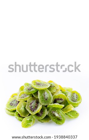 A bunch of dry kiwi on a white background. Suitable for Advertising Banner. A dried kiwi fruit snack.