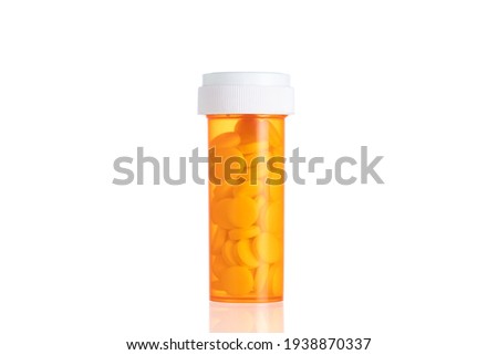 Plastic Medical Yellow Bottle on a white background. Pills in Yellow  Bottle.