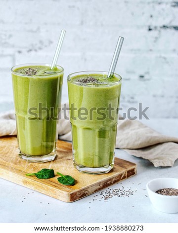 Green Smoothie. Green Smoothie from Spinach, Banana and Peer with Chia Seeds Royalty-Free Stock Photo #1938880273