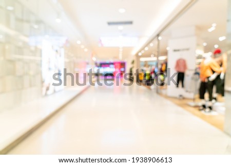 abstract blur shop and retail store in shopping mall for background Royalty-Free Stock Photo #1938906613