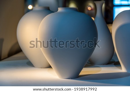 White porcelain, displayed in the pottery exhibition hall Royalty-Free Stock Photo #1938917992