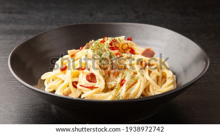 Peperoncino spaghetti on a plate Royalty-Free Stock Photo #1938972742