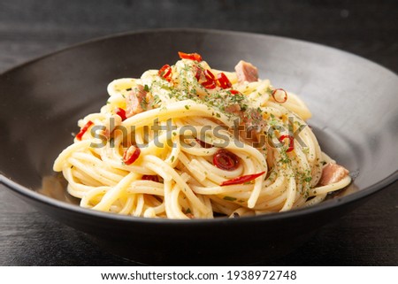 Peperoncino spaghetti on a plate Royalty-Free Stock Photo #1938972748