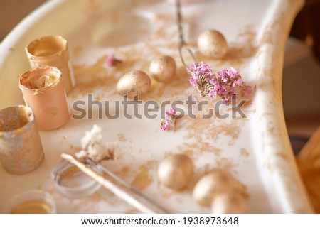 Easter background with quaill eggs and flowers