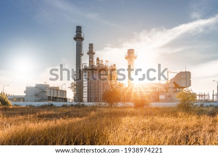 Industrial zone,The equipment of oil refining,Close-up of industrial pipelines of an oil-refinery plant,Detail of oil pipeline with valves in large oil refinery. Royalty-Free Stock Photo #1938974221