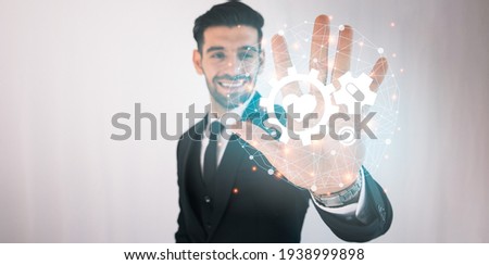 Businessman wear suit holding illustration gear of healthy graphic icons digital knowledge, strategy and growth investment business target goal, media and technology for future concept.