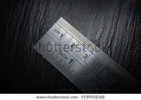 tip of the material metal ruler,photo art. creative photography 