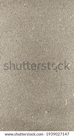 Detail of outdoor paving, view of a concrete surface on the sidewalk