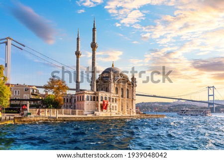 The Bosphorus Bridge and the Ortakoy Mosque at sunset, Istanbul Royalty-Free Stock Photo #1939048042