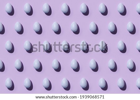 Easter egg pattern in violet or light purple. Happy Easter. Minimal concept. Flat lay. Top view.
