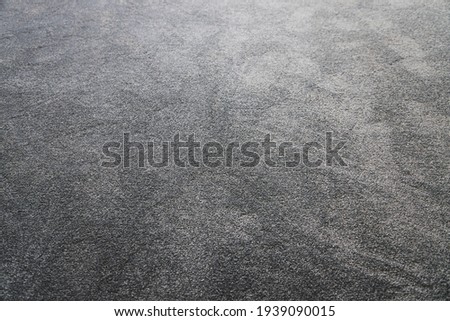 empty room with brand new grey blue carpet laid on the floor and freshly painted white walls, home renovation and home improvement concept Royalty-Free Stock Photo #1939090015