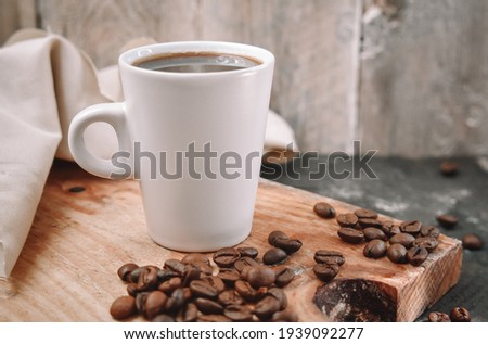 Coffee beans on wooden Close Up Photography Royalty-Free Stock Photo #1939092277