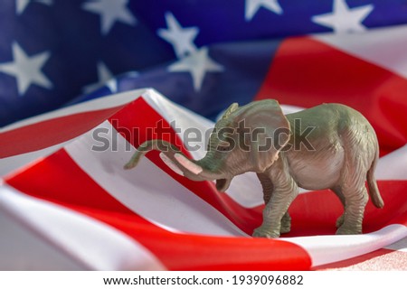 Republican Elephant with American Flag on wooden Royalty-Free Stock Photo #1939096882