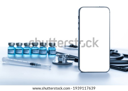 Smartphone mockup. Doctor stethoscope, hospital healthcare charts, syringe with needle and black smartphone with blank screen on medical equipment background. For design application, website project