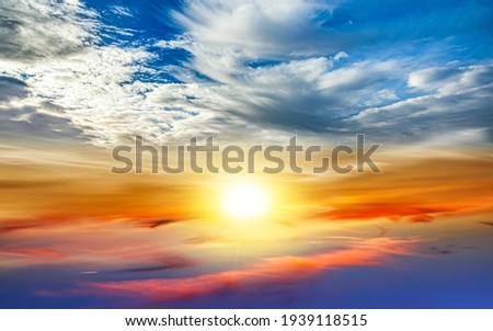 colorful sky with sun in clouds of altitude Royalty-Free Stock Photo #1939118515