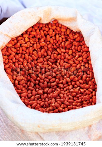 Detail of a sack of red kidney beans sold in bulk at street markets and grown in local orchards