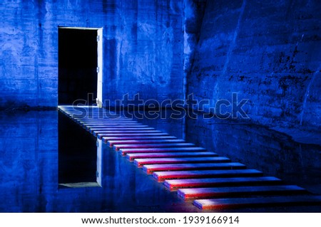Illuminated path to exit in concrete bunker