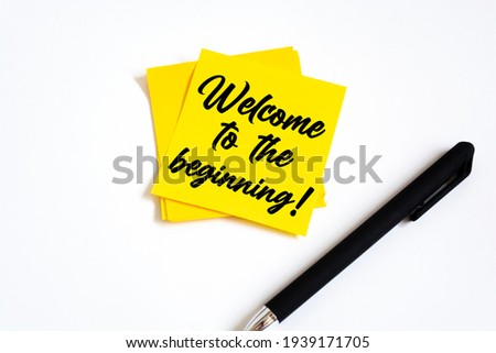 Text welcome to the beginning on the short note texture background
