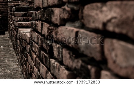 Close up shot at ancient brick from the old temple's ruin, Thailand.