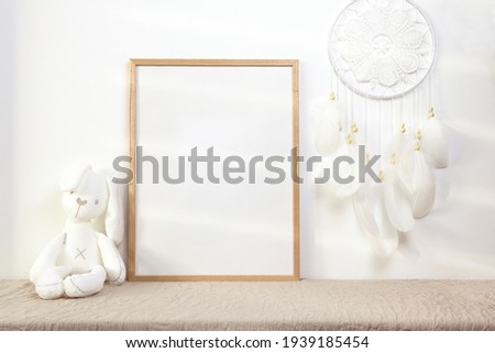 Nursery frame mockup with white bunny and dreamcatcher
