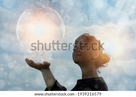Ecology image, CG of a woman trying to touch the earth Royalty-Free Stock Photo #1939216579