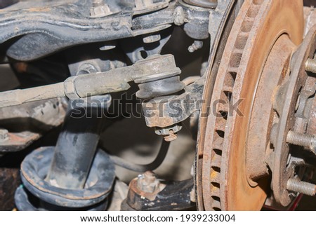 Outer Tie Rod End Ball Joint and Inner Tie Rod End Ball Joint and Wheel Hub and Shock Absorber Royalty-Free Stock Photo #1939233004