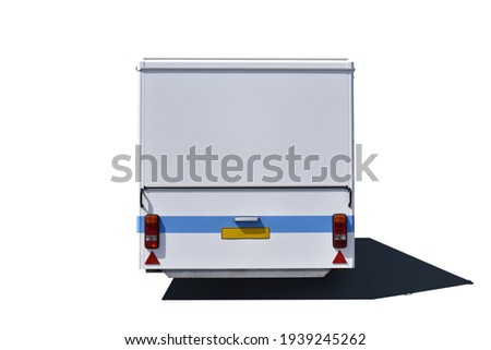 back of small enclosed trailer isolated on white background Royalty-Free Stock Photo #1939245262