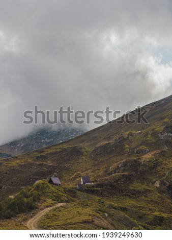Beautiful landscape. Mountains. A house in a mountainous area.