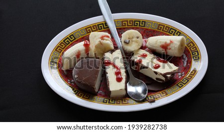 This is photo Dessert ice cream with spoon on the plate