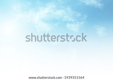 Blue sky with white cloud. The summer heaven is colorful clearing day Good weather and beautiful nature in the morning. Royalty-Free Stock Photo #1939351564