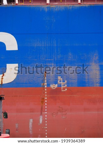 Draft mark and load line mark of a cargo ship out bulk carrier. Royalty-Free Stock Photo #1939364389