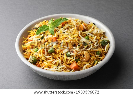 Veg biryani or veg pulav, Fried rice indian food Royalty-Free Stock Photo #1939396072