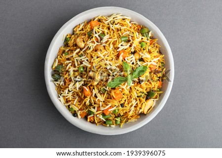 Veg biryani or veg pulav, Fried rice indian food Royalty-Free Stock Photo #1939396075