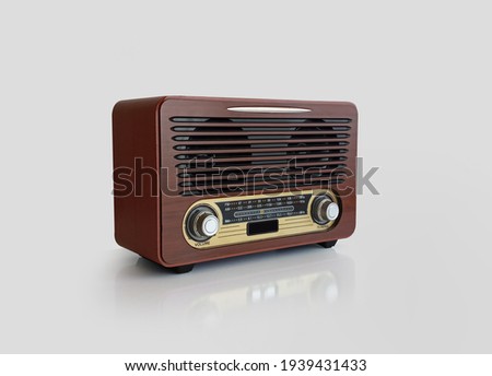 Old brown radio, retro radio without background. Perspective vintage radio isolated. Royalty-Free Stock Photo #1939431433