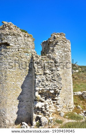 ruins of a fortress on a hill, an ancient building Royalty-Free Stock Photo #1939459045