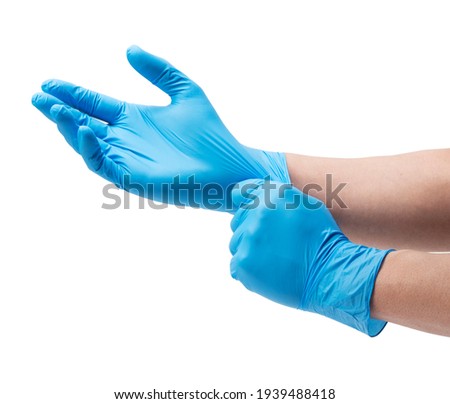 Two hands of a man wearing nitrile gloves on a white background Royalty-Free Stock Photo #1939488418