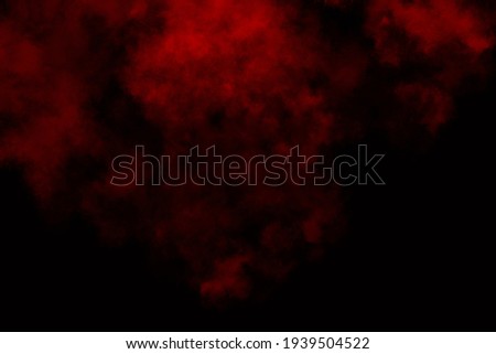 red fog and smoke effect on black background.

