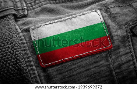 Tag on dark clothing in the form of the flag of the Bulgaria