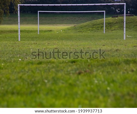 
soccer cages on empty soccer field