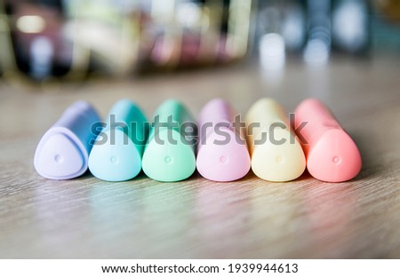 pastel markers on the desk, multicolored, rainbow colors Royalty-Free Stock Photo #1939944613