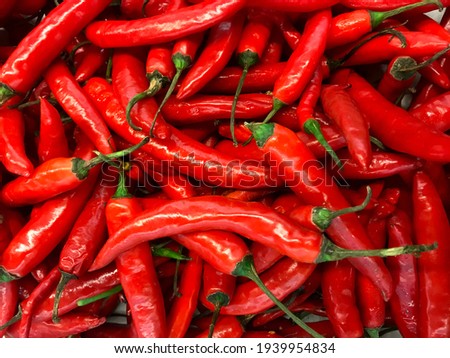 red chillies for texture background Royalty-Free Stock Photo #1939954834
