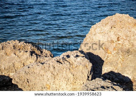 three big rocks in the blue sea